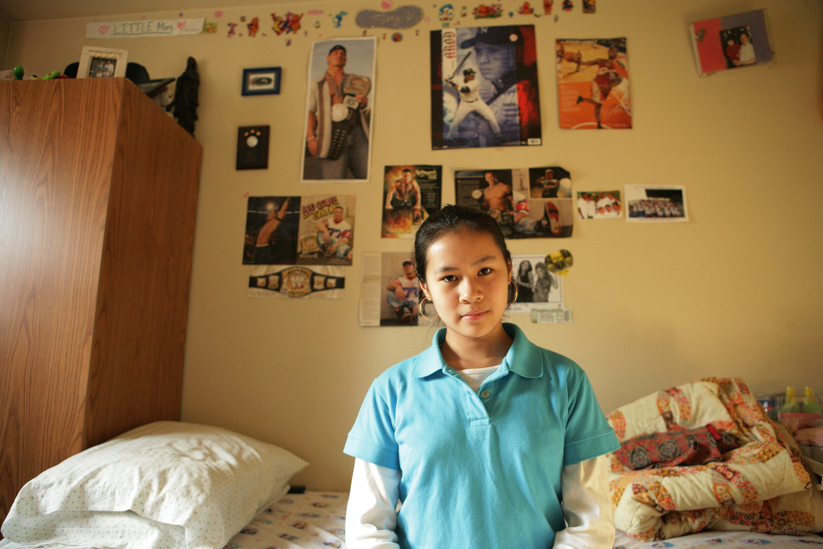 Girl at home in her bedroom.