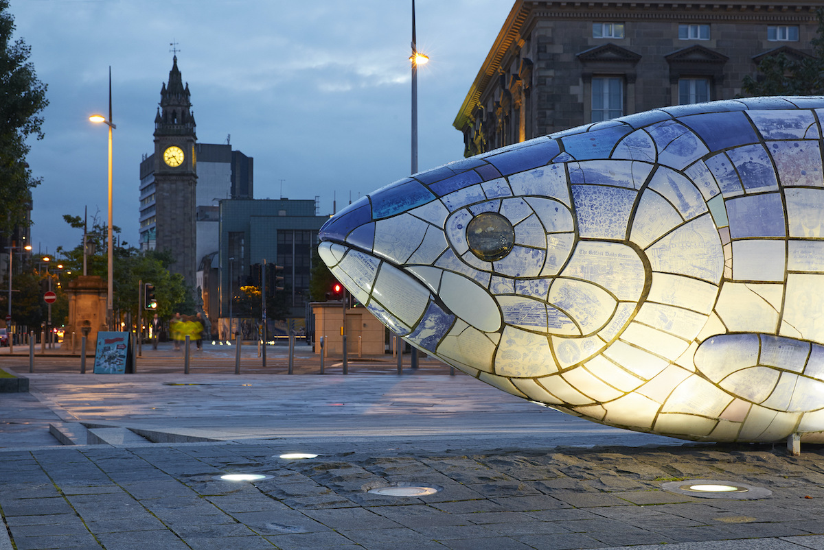 The 'Big Fish' sculpture in Belfast illuminated at night