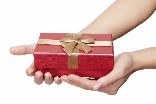 Hands offering a gift