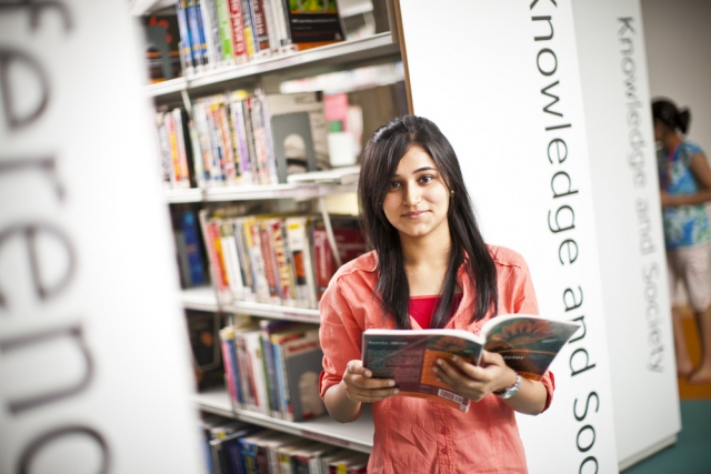 woman in a library