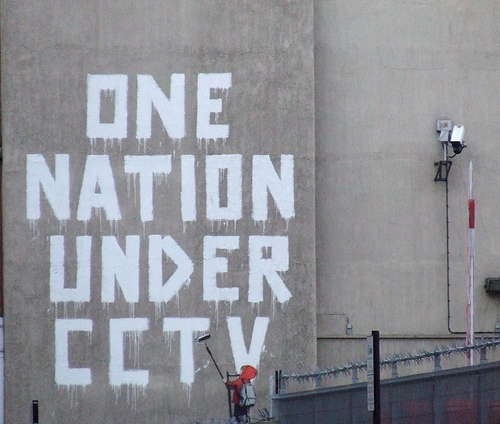 A Banksy image with the words 'One nation under CCTV'