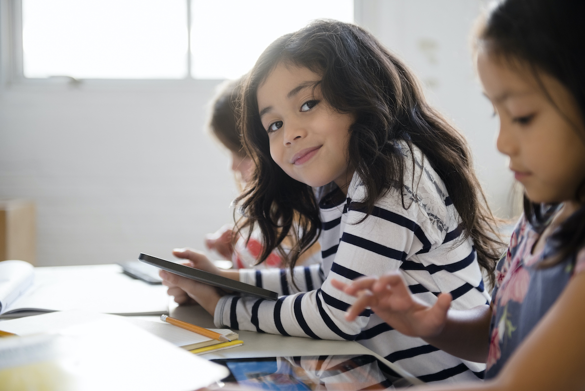 Children smiling in class