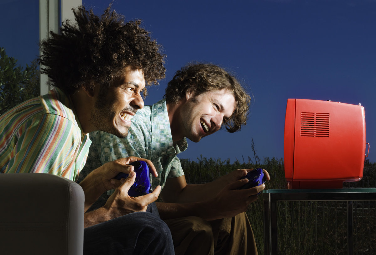 Two people playing a computer game