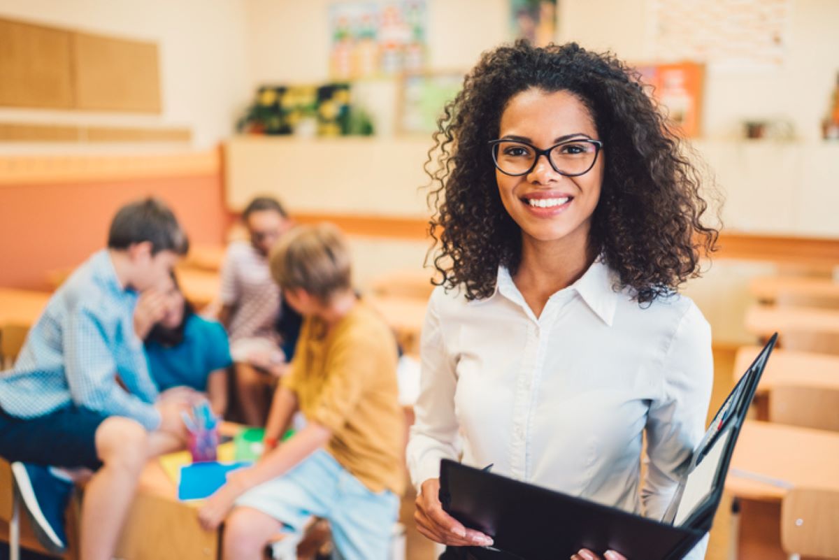 Teacher with students working in groups