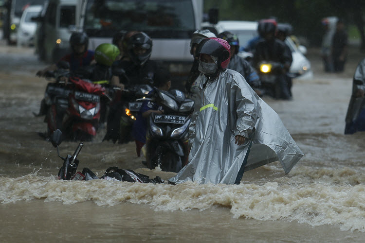 Vehicles in a flooded street