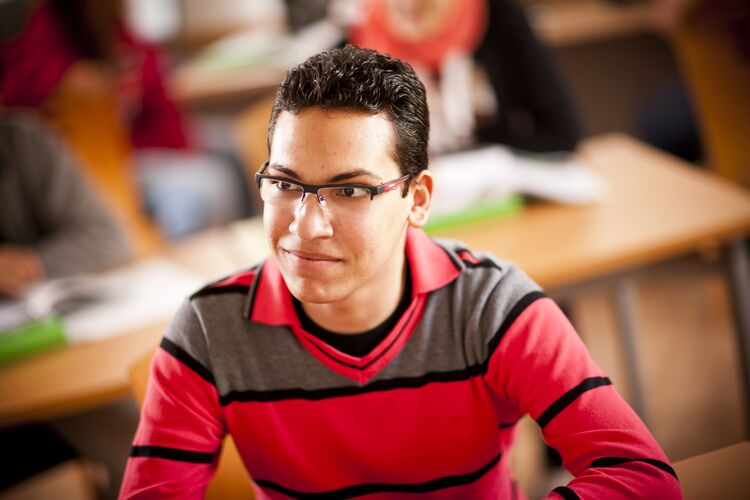 Student in Egypt listening to teacher