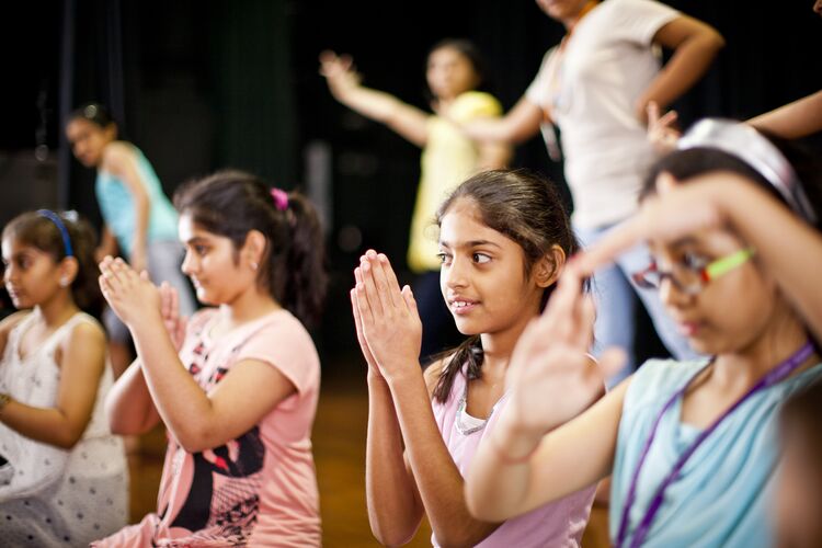 Young learners responding to a question with gestures