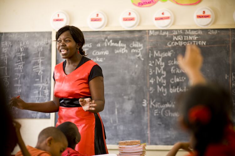 Teacher setting up an activity