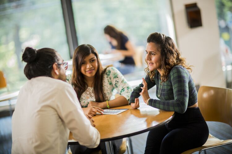 Three students in Mexico talking together