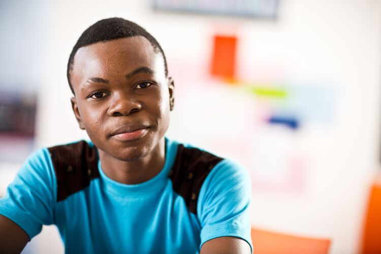 A smiling student in Mozambique