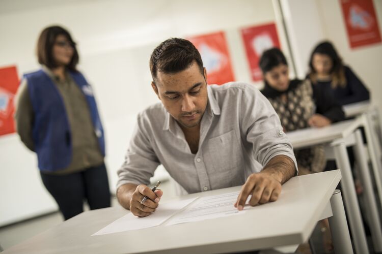 Man in Pakistan taking a test