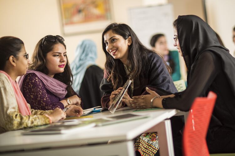 Students working together in a classroom in Pakistan