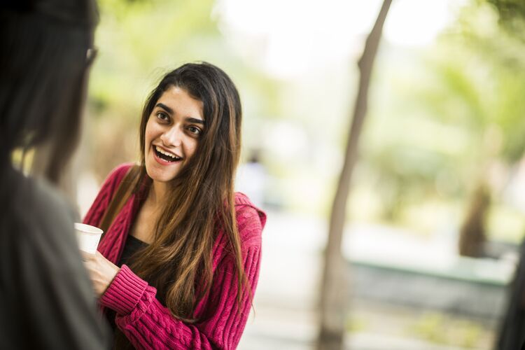 a girl talking outside