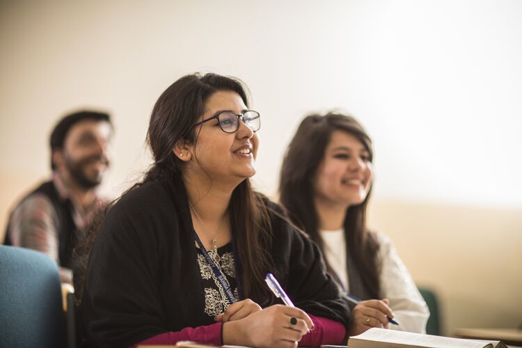 A student in a classroom in Pakistan