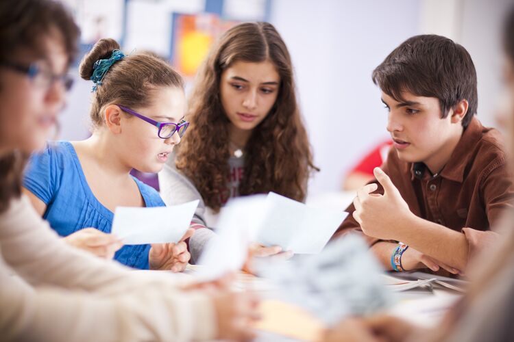 Students speaking in a classroom in Portugal