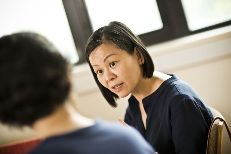 An adult student in a classroom in Singapore