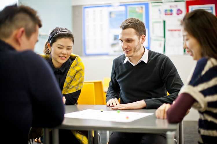 Students in South Korea working together at a table