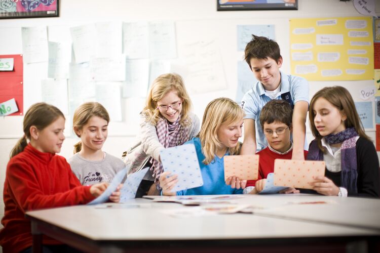 young learners playing with cards