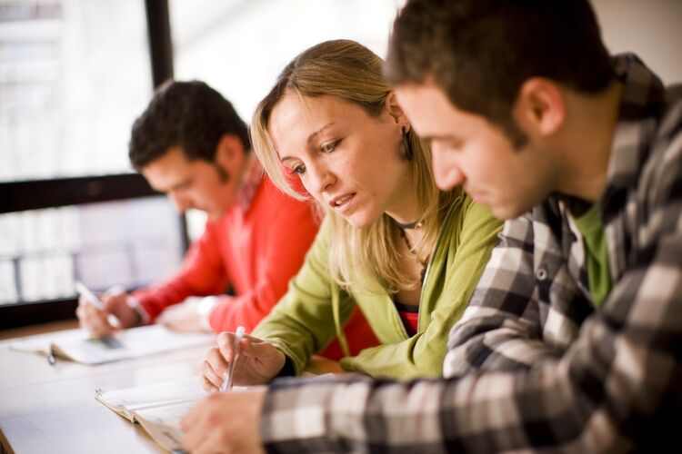 learners in classroom in Spain talking together