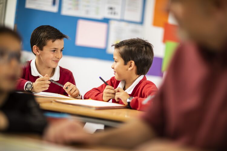 Two young students in Spain working together