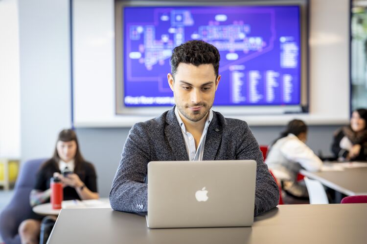 Man looking at laptop