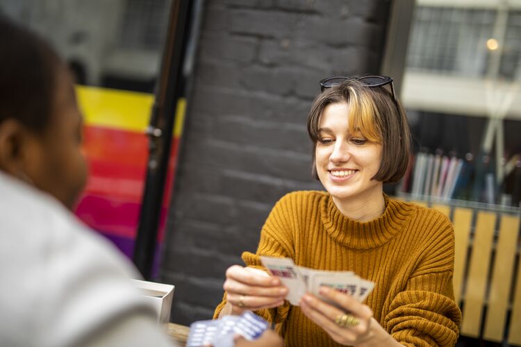 Two students playing with vocabulary cards