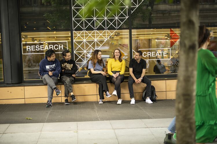 Students sitting outside in the UK