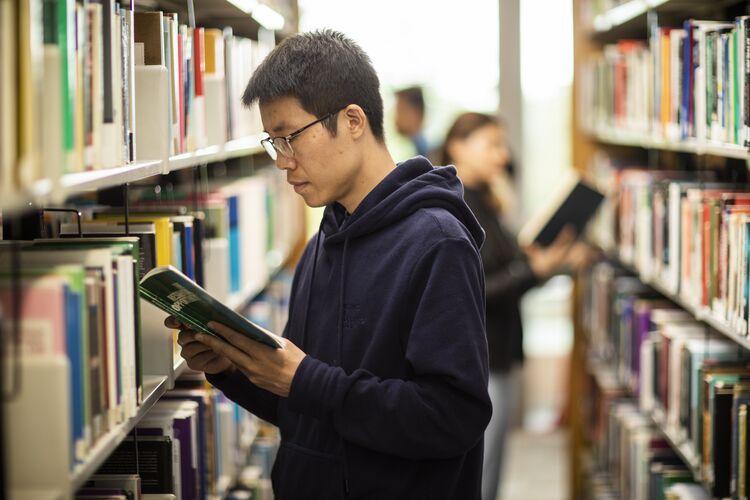 Student in library