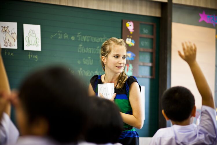 Teacher in Thailand asking students a question