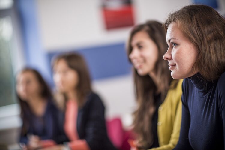 Students in ukraine looking at teacher