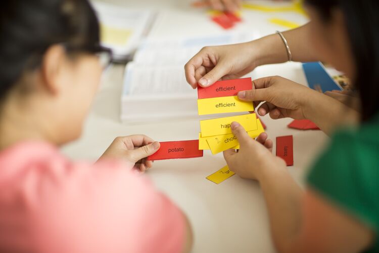 Learners in Vietnam play with word cards