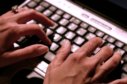 Fingers typing on a keyboard